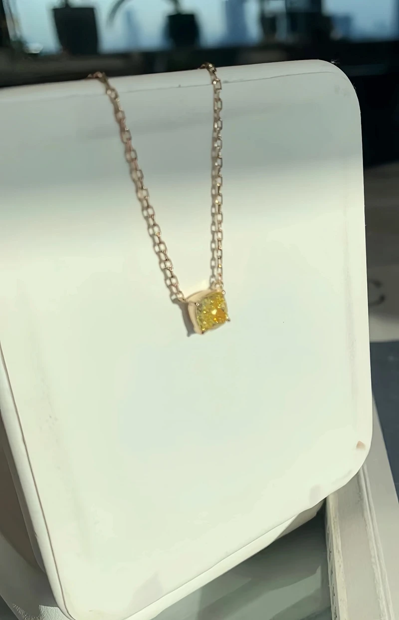 radiant cut fancy vivid yellow lab grown loose diamond 2